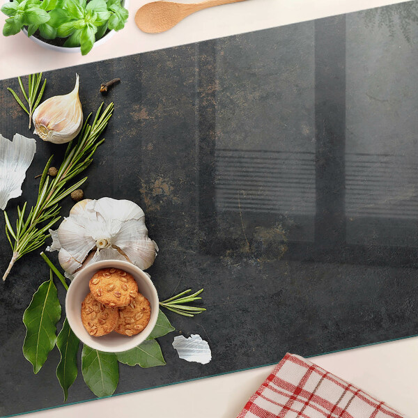 Planche à découper verre Fleurs et herbes sur fond de marbre