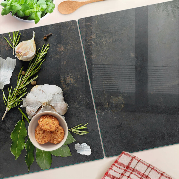 Planche à découper verre Fleurs et herbes sur fond de marbre