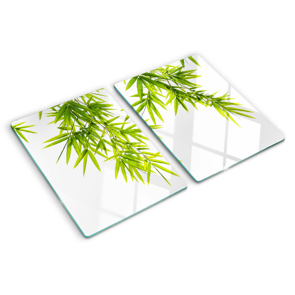 Planche à découper verre Feuilles de bambou sur fond de fenêtre