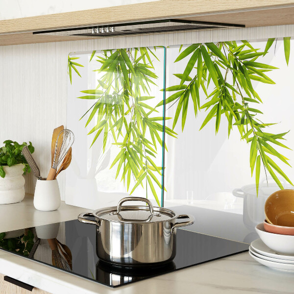 Planche à découper verre Feuilles de bambou sur fond de fenêtre