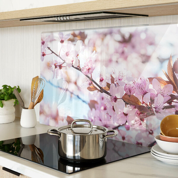 Planche à découper en verre Fleurs de cerisier sur fond bleu