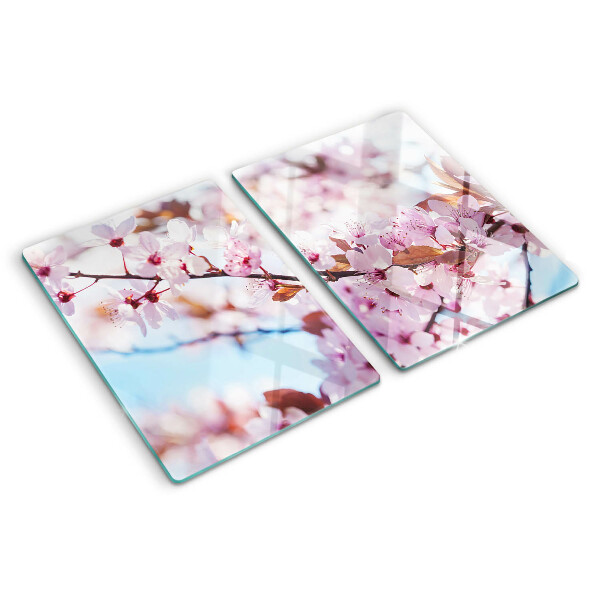 Planche à découper en verre Fleurs de cerisier sur fond bleu
