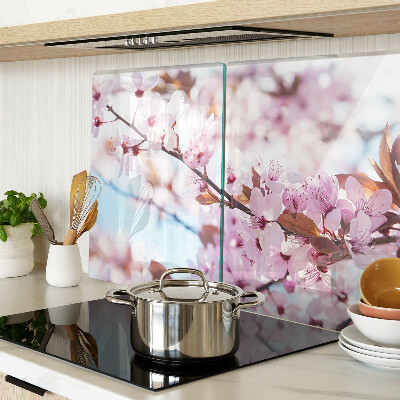 Planche à découper en verre Fleurs de cerisier sur fond bleu