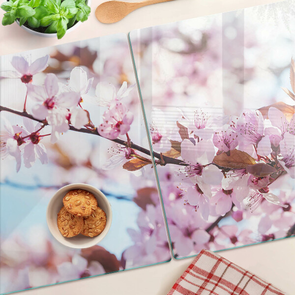 Planche à découper en verre Fleurs de cerisier sur fond bleu