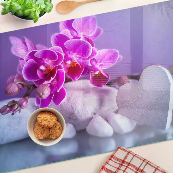 Planche à découper verre Orchidées sur pierres