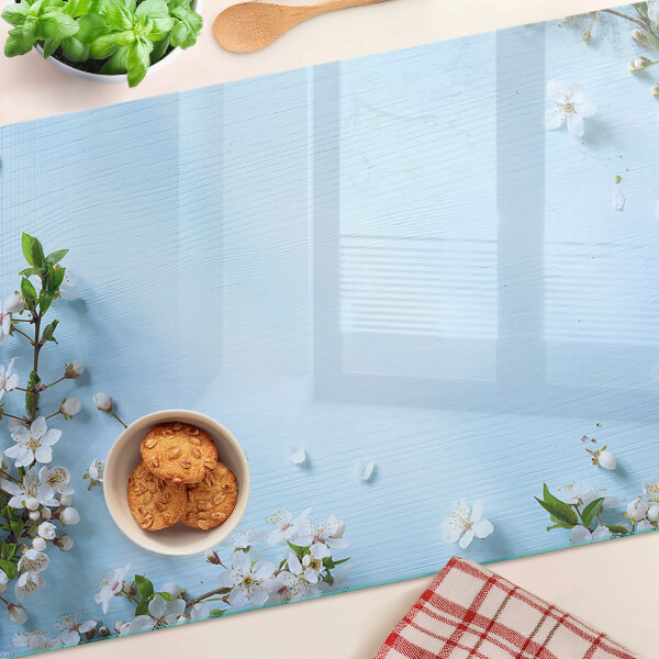 Planche à découper en verre Motif floral sur fond bleu