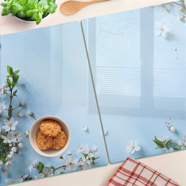 Planche à découper en verre Motif floral sur fond bleu