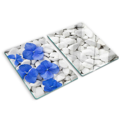Planche à découper en verre Fleurs bleues sur pierres blanches