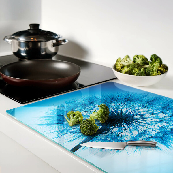 Planche à découper en verre Pissenlit sur fond bleu