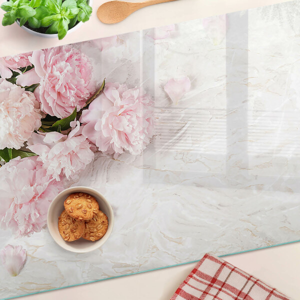 Planche à découper verre Fleurs de pivoine sur fond de marbre
