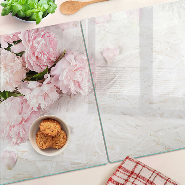 Planche à découper verre Fleurs de pivoine sur fond de marbre