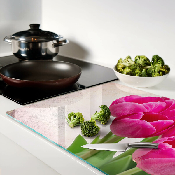 Planche à découper en verre Fleurs de tulipes sur fond rose