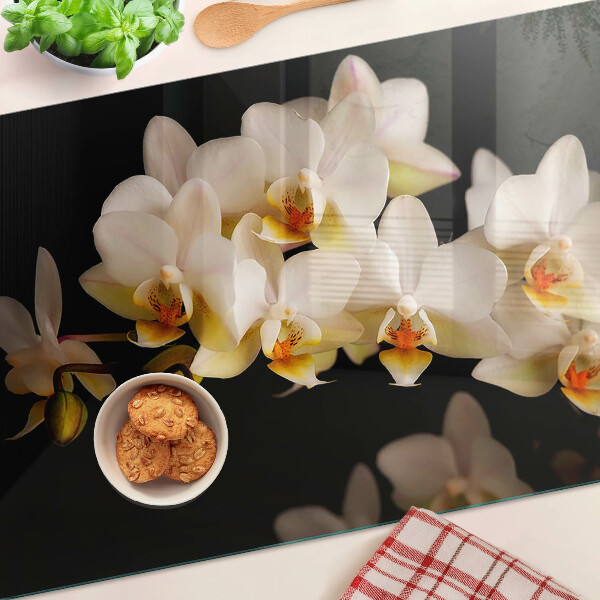 Planche à découper en verre Orchidées sur fond noir