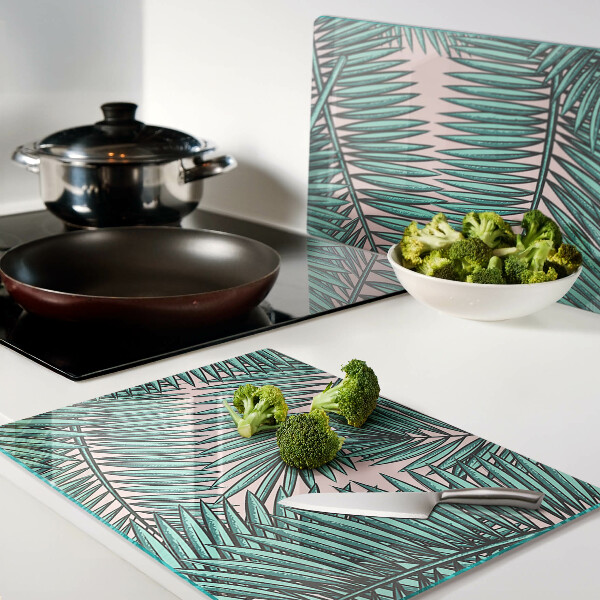 Planche à découper verre Feuilles de palmier sur fond rose