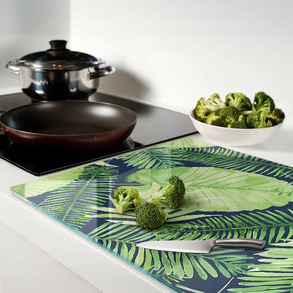 Planche à découper en verre Feuilles tropicales sur fond sombre