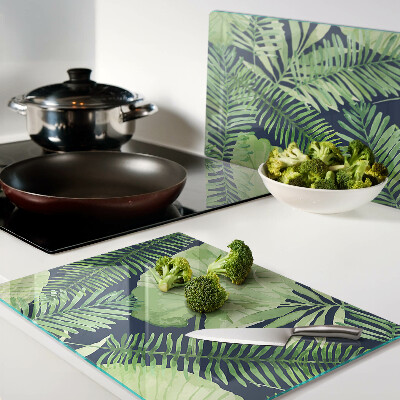Planche à découper en verre Feuilles tropicales sur fond sombre