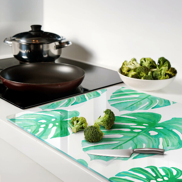 Planche à découper verre Feuilles de Monstera sur fond blanc