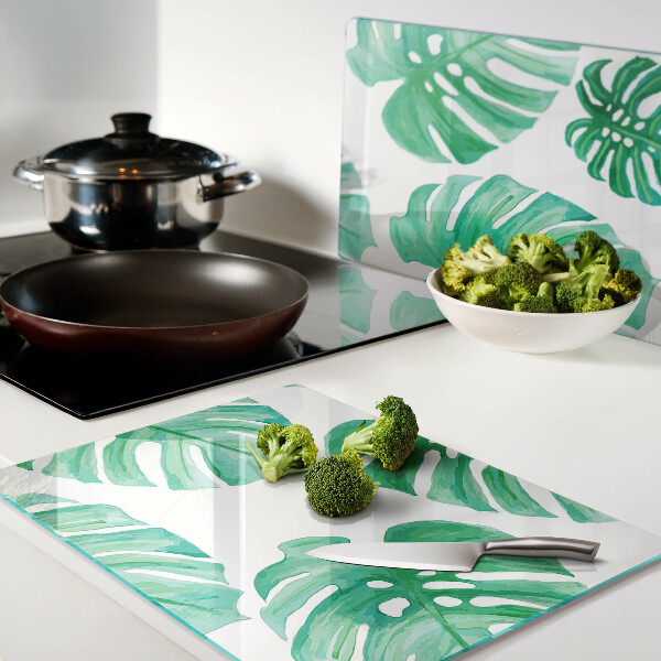 Planche à découper verre Feuilles de Monstera sur fond blanc