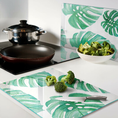 Planche à découper verre Feuilles de Monstera sur fond blanc