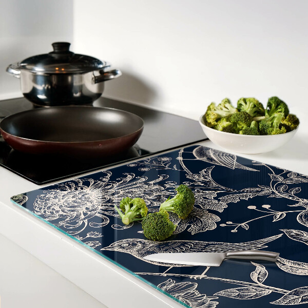 Planche à découper verre Fleurs et oiseaux sur fond sombre