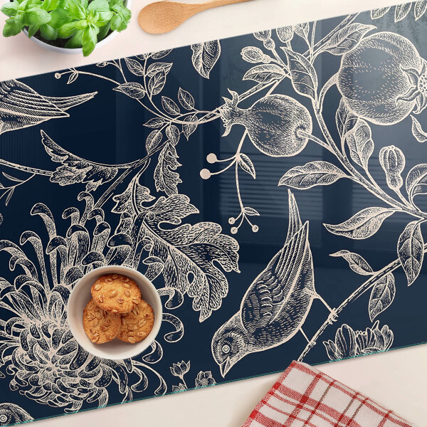 Planche à découper verre Fleurs et oiseaux sur fond sombre