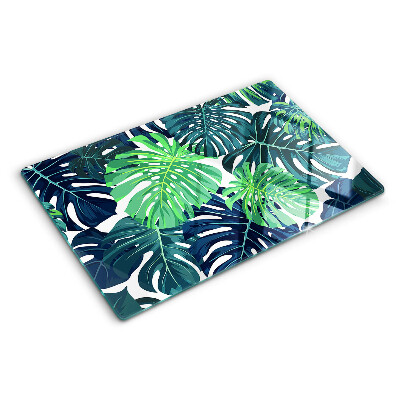 Planche à découper en verre Feuilles de Monstera sur fond tropical