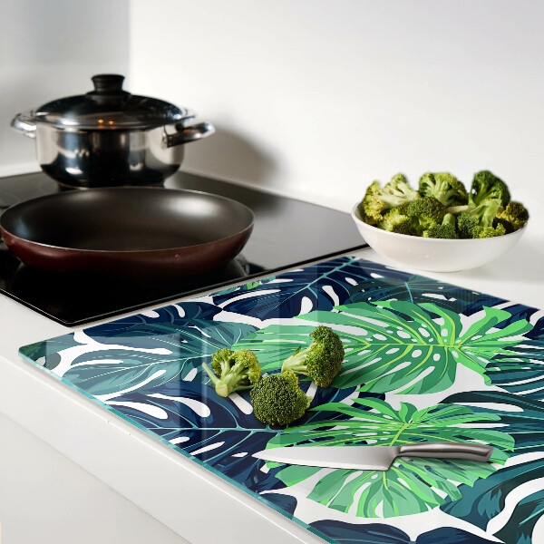 Planche à découper en verre Feuilles de Monstera sur fond tropical