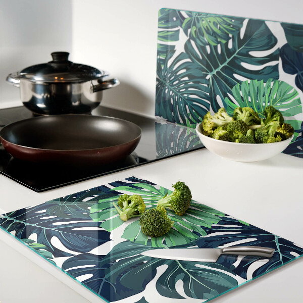 Planche à découper en verre Feuilles de Monstera sur fond tropical