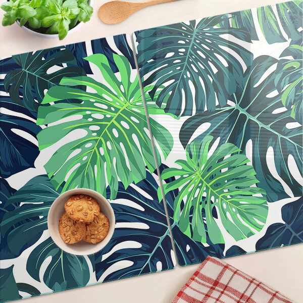 Planche à découper en verre Feuilles de Monstera sur fond tropical