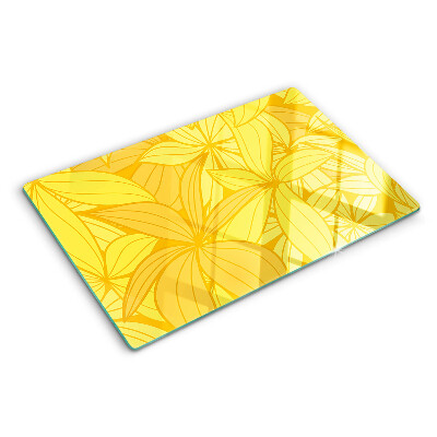 Planche à découper en verre Feuilles jaunes dans un style tropical