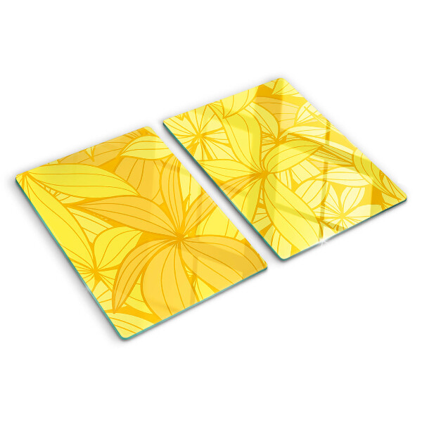 Planche à découper en verre Feuilles jaunes dans un style tropical