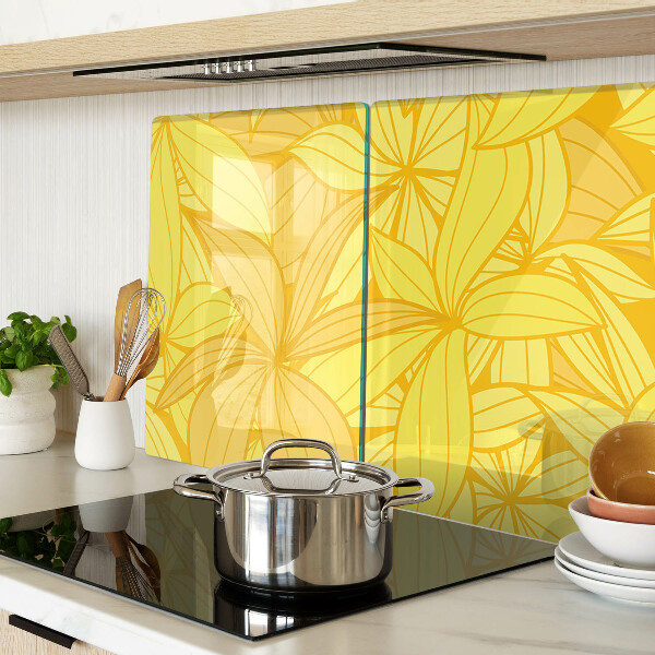 Planche à découper en verre Feuilles jaunes dans un style tropical
