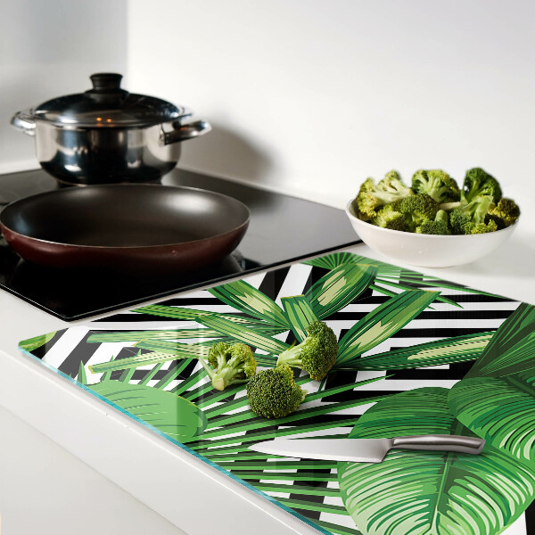 Planche à découper en verre Feuilles tropicales sur rayures
