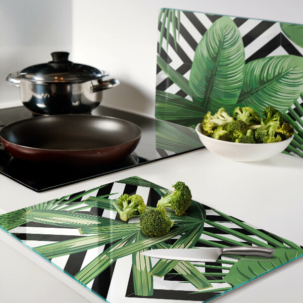 Planche à découper en verre Feuilles tropicales sur rayures
