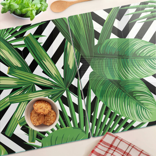 Planche à découper en verre Feuilles tropicales sur rayures