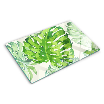 Planche à découper en verre Feuilles de Monstera sur fond clair