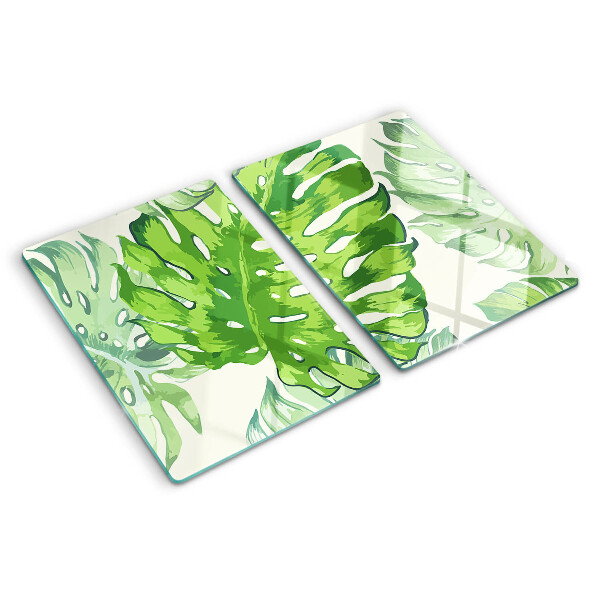 Planche à découper en verre Feuilles de Monstera sur fond clair
