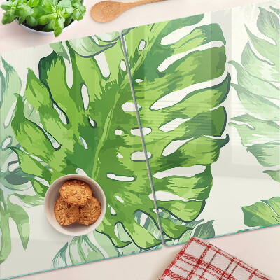Planche à découper en verre Feuilles de Monstera sur fond clair