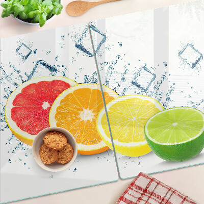 Planche à découper en verre Agrumes en tranches colorées