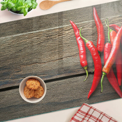 Planche à découper verre Piments sur fond de bois