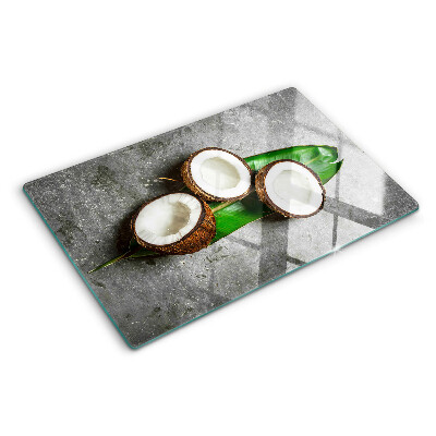 Planche à découper en verre Noix de coco sur fond de béton