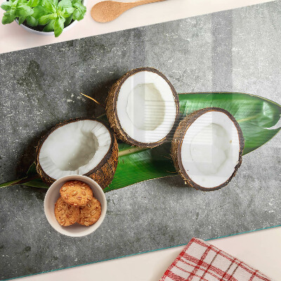 Planche à découper en verre Noix de coco sur fond de béton