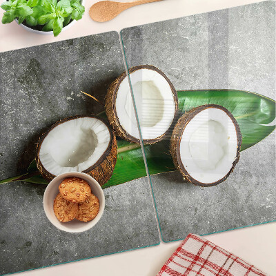 Planche à découper en verre Noix de coco sur fond de béton
