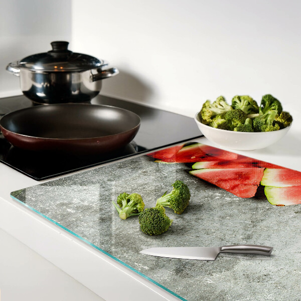 Planche à découper en verre Tranches de pastèque sur fond gris