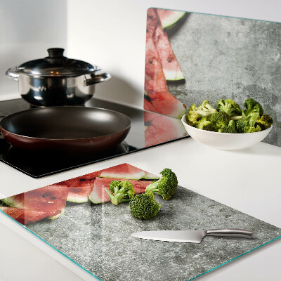 Planche à découper en verre Tranches de pastèque sur fond gris