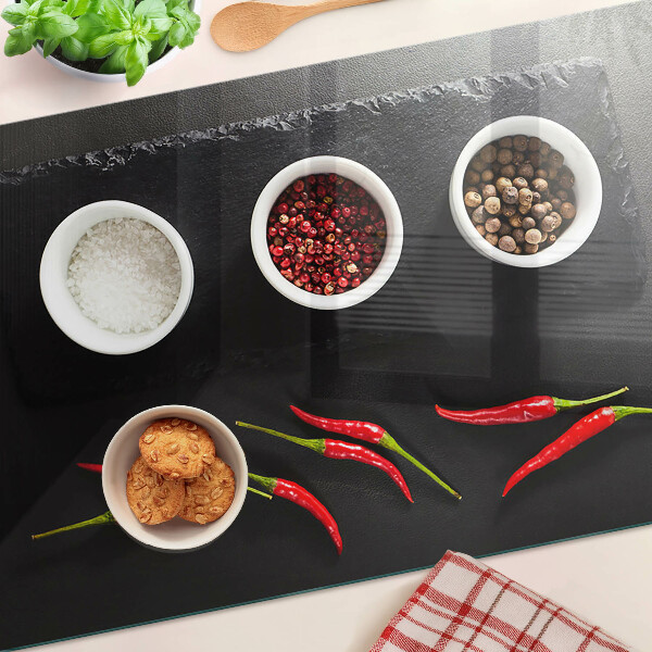 Planche à découper verre Épices et poivrons rouges