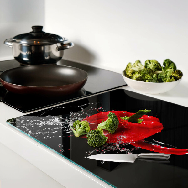 Planche à découper en verre Poivron rouge dans l'eau