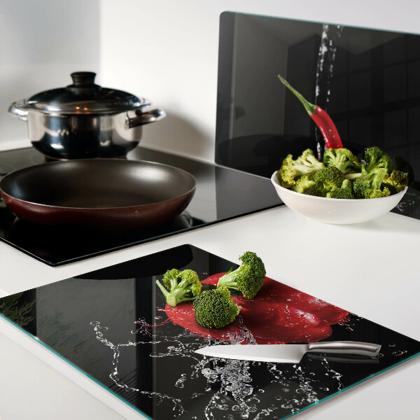 Planche à découper en verre Poivron rouge dans l'eau