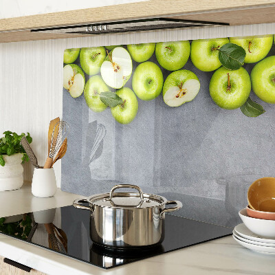 Planche à découper verre Pommes vertes sur une surface grise