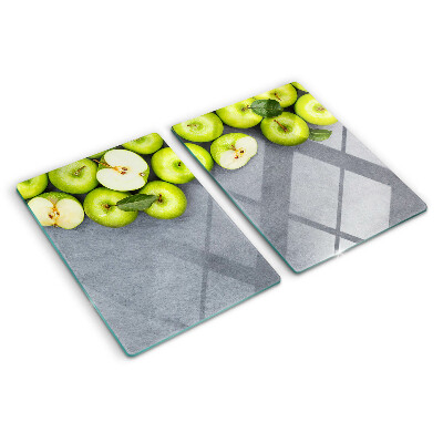 Planche à découper verre Pommes vertes sur une surface grise